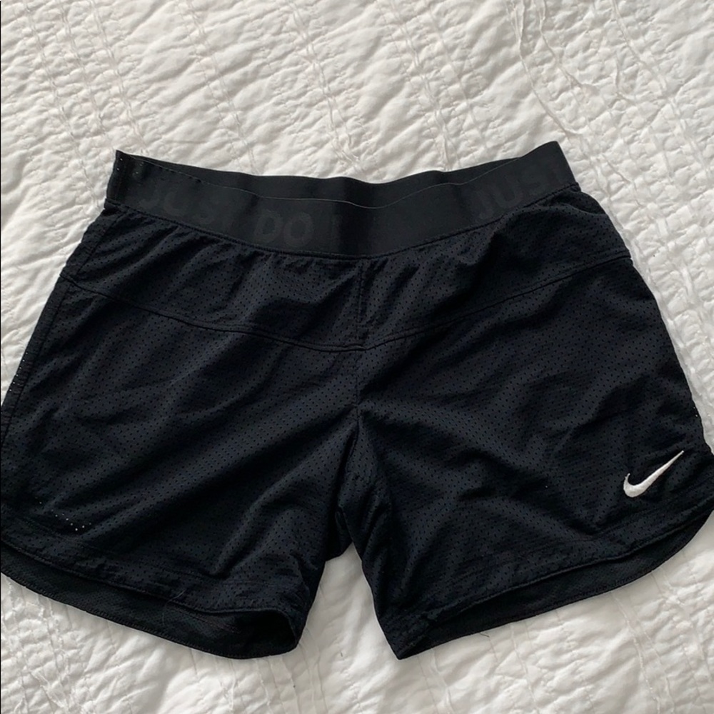 Nike training shorts.